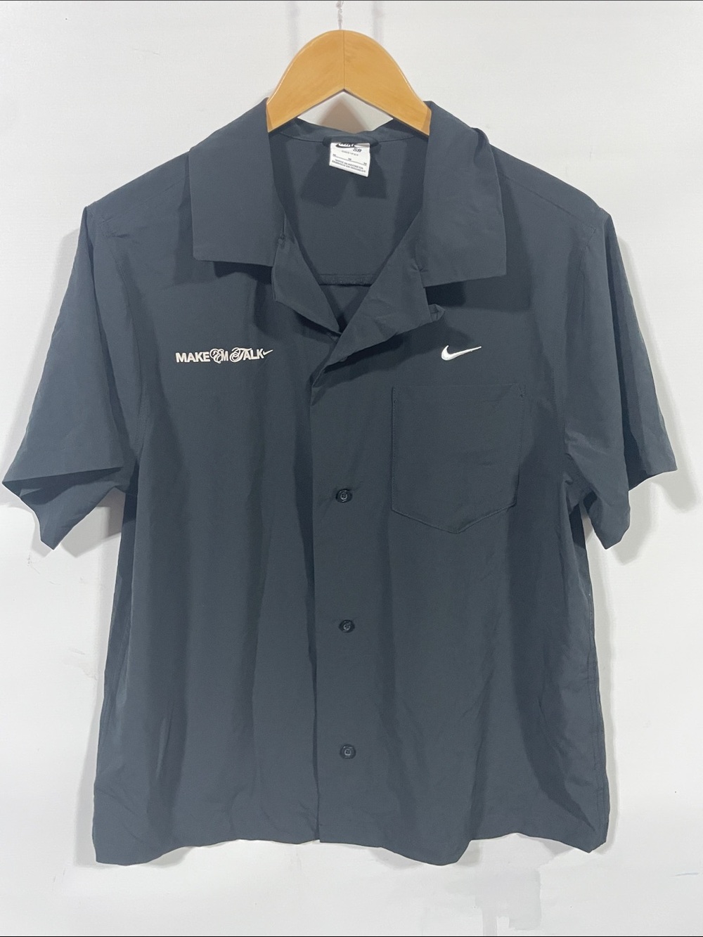 Nike Black Short-Sleeve Button-Up Polo Shirt with White Swoosh